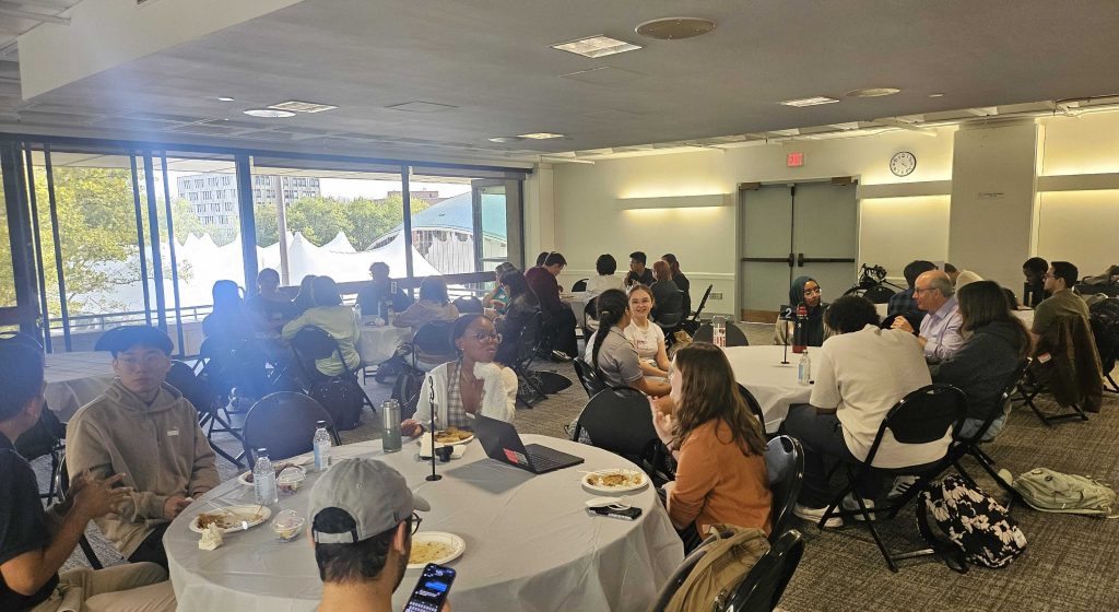student eating at tables